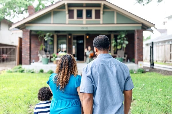 Couple looking at their home